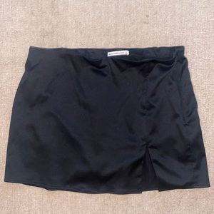 Black satin mini skirt